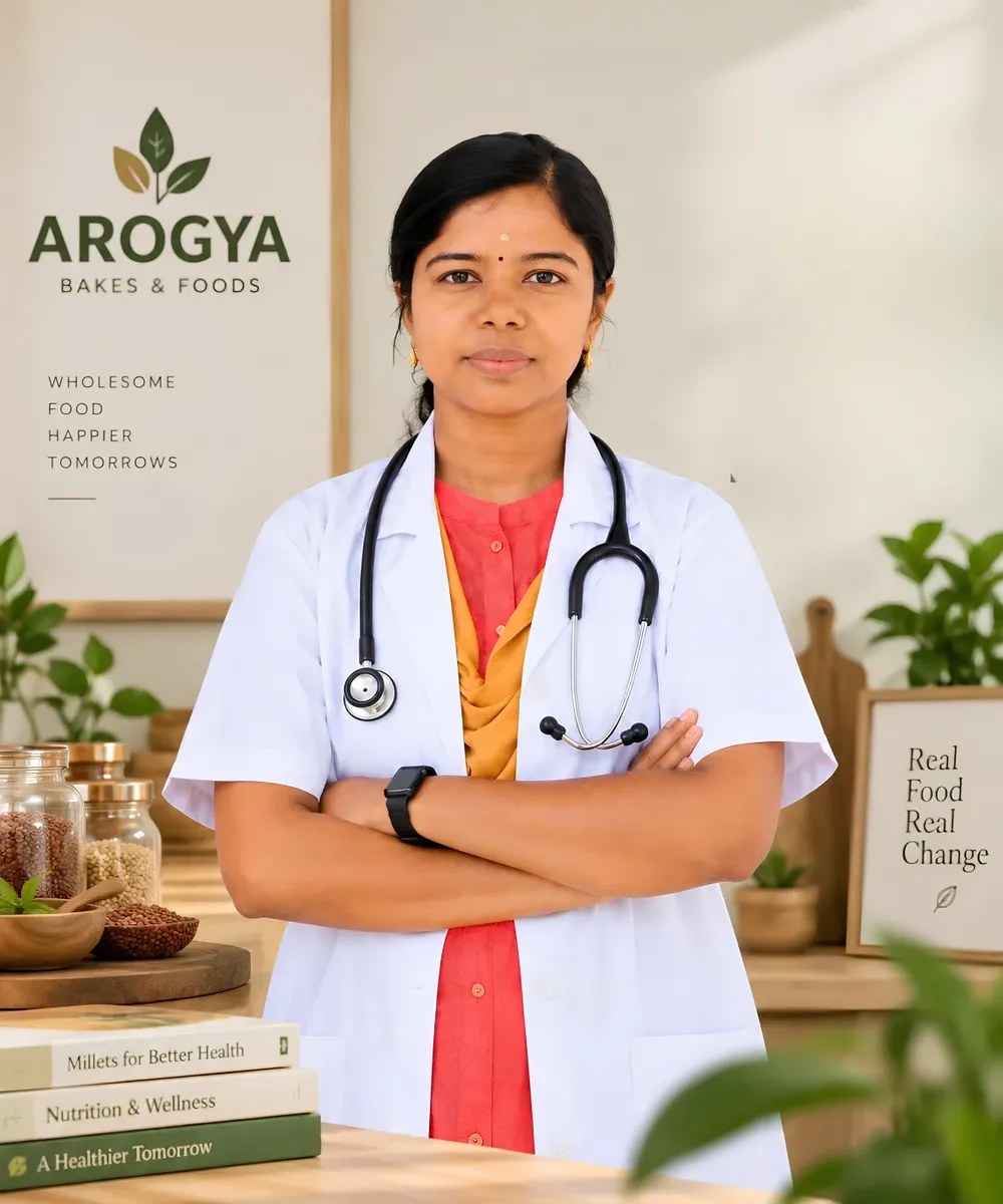 Dr. N. Sabari Girija, Siddha Doctor and founder of Arogya Bakes & Foods, in a white doctor coat